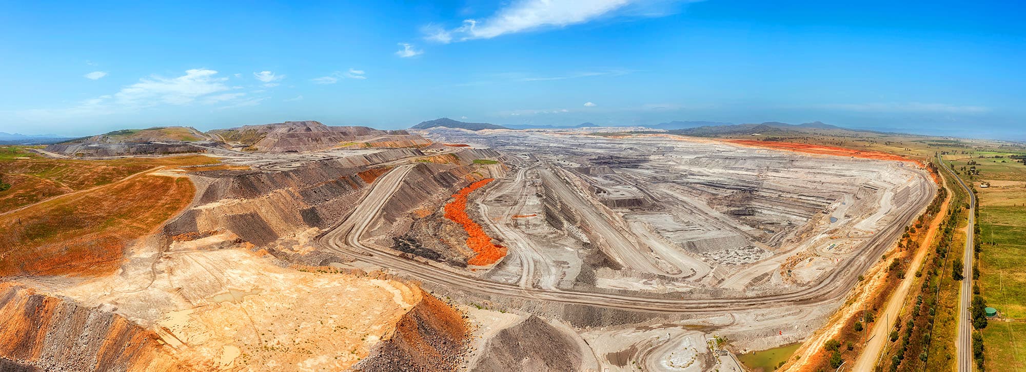 Open-cut coal mining continues to shape the Hunter Valley, where large-scale operations underpin jobs, exports and ongoing regional economic activity.